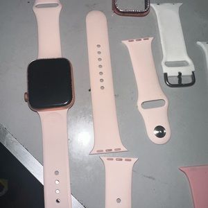 Apple Watch series 8. Apple case with a few apple watch bands. Charger included